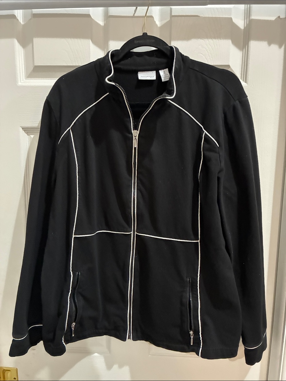 Ladies zip up cotton/ spandex material.